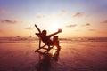 Happy freelancer with laptop computer working on beach, freelance work concept, dream job Royalty Free Stock Photo