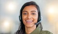 Happy, friendly and confident face of a call center agent smiling in her office with copy space. Portrait of a female Royalty Free Stock Photo