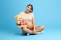 Happy friendly kind woman having fun with teddy bear Royalty Free Stock Photo