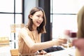 Friends Celebrate with Toast and Clink in Restaurant