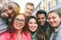 Happy friends from diverse cultures and races taking selfie with back lighting - Youth and friendship concept with young people Royalty Free Stock Photo