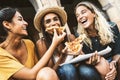 Happy friends eating street food on summer vacation Royalty Free Stock Photo