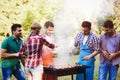 Happy friends enjoying barbecue party Royalty Free Stock Photo