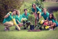 Happy friends gardening for the community Royalty Free Stock Photo