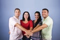 Happy friends with hands together Royalty Free Stock Photo