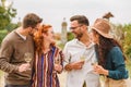 Happy friends having fun drinking wine at vineyard Royalty Free Stock Photo