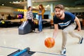 Handsome man bowling Royalty Free Stock Photo