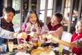 Happy friends having fun in hot pot Royalty Free Stock Photo