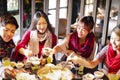 Friends having fun in hot pot restaurant Royalty Free Stock Photo