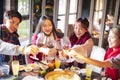 Friends having fun in hot pot restaurant Royalty Free Stock Photo