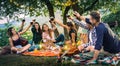 Happy friends having fun at vineyard on sunset - Young people millenial toasting at open air picnic under string light Royalty Free Stock Photo