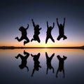 Happy friends jumping outdoor Royalty Free Stock Photo