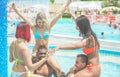 Happy friends making swimming pool party in resort hotel for summer vacation - Young people having fun in aqua park - Friendship Royalty Free Stock Photo