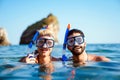 Happy friends men enjoying summer vacation and scuba diving Royalty Free Stock Photo