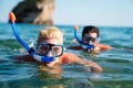 Happy friends men enjoying summer vacation and scuba diving Royalty Free Stock Photo