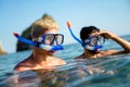 Happy friends men enjoying summer vacation and scuba diving Royalty Free Stock Photo