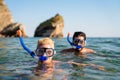 Happy friends men enjoying summer vacation and scuba diving Royalty Free Stock Photo