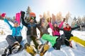 Happy friends on mountain enjoying on winter day Royalty Free Stock Photo