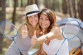 happy friends playing badminton at summer garden Royalty Free Stock Photo