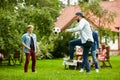 Happy friends playing football at summer garden Royalty Free Stock Photo