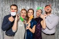 Happy friends posing with christmas party props Royalty Free Stock Photo