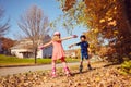 Happy friends roller skating outstretching hands Royalty Free Stock Photo