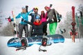 Happy friends snowboarders and skiers have fun on the slope Royalty Free Stock Photo