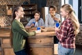 Happy friends spending time together with pizza and soda drinks Royalty Free Stock Photo