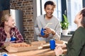 Happy friends spending time together with pizza and soda drinks Royalty Free Stock Photo