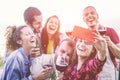 Happy friends taking selfie during party dinner at home backyard - Group of young people having fun with trends technologies - Royalty Free Stock Photo