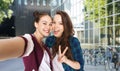 happy friends taking selfie and showing peace Royalty Free Stock Photo