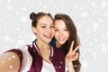 Happy friends taking selfie and showing peace Royalty Free Stock Photo