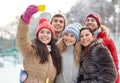 Happy friends taking selfie with smartphone Royalty Free Stock Photo