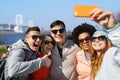 Happy friends taking selfie with smartphone Royalty Free Stock Photo