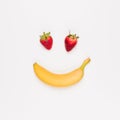 The Happy Fruit red strawberry yellow banana white background Royalty Free Stock Photo