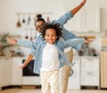 Happy funny african american family excited little boy son having fun with father at home Royalty Free Stock Photo