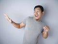 Happy Funny Asian Man Dancing Full of Joy Royalty Free Stock Photo