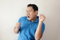 Happy Funny Asian Man Dancing Full of Joy Royalty Free Stock Photo