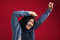 Happy Funny Asian Muslim Woman Dancing Full of Joy