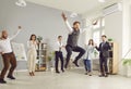 Happy funny business people having fun jump in jumping rope during a meeting in office Royalty Free Stock Photo