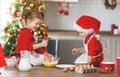 Happy children bake christmas cookies Royalty Free Stock Photo