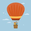 Happy funny couple flying in a hot air balloon romantic trip