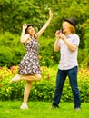 Couple blowing bubbles outdoor Royalty Free Stock Photo