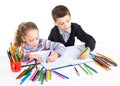 Happy funny kids draw. The boy and the girl draws pencils. Creativity concept.