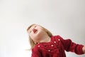 Happy funny little girl emotional playing. cute caucasian blond baby girl Royalty Free Stock Photo