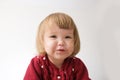 Happy funny little girl emotional playing. cute caucasian blond baby