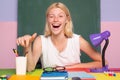 Happy funny teacher winking. Portrait of teacher at school. Education concept.