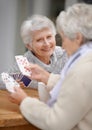 Happy, game and portrait of old people playing cards for happiness and enjoyment in a nursing home. Smile, hobby and Royalty Free Stock Photo