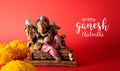 Happy Ganesh Chaturthi festival, Bronze Ganesha statue and Golden texture with flowers, Ganesh is hindu god of Success