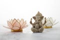 Happy Ganesh Chaturthi festival, Lord Ganesha statue with lotus on marble background,